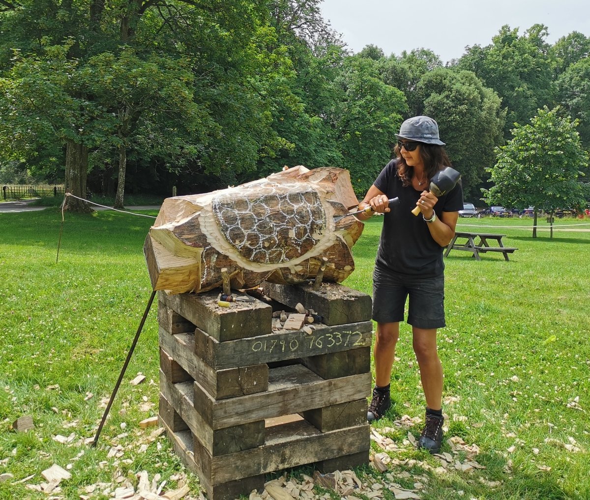 Photograph of Natasha Houseago creating a sculpture