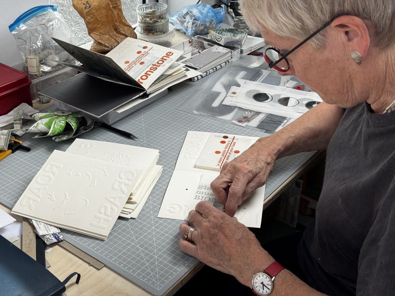 Jane Sasanow making an artist book. Photography by Naomi Ness.