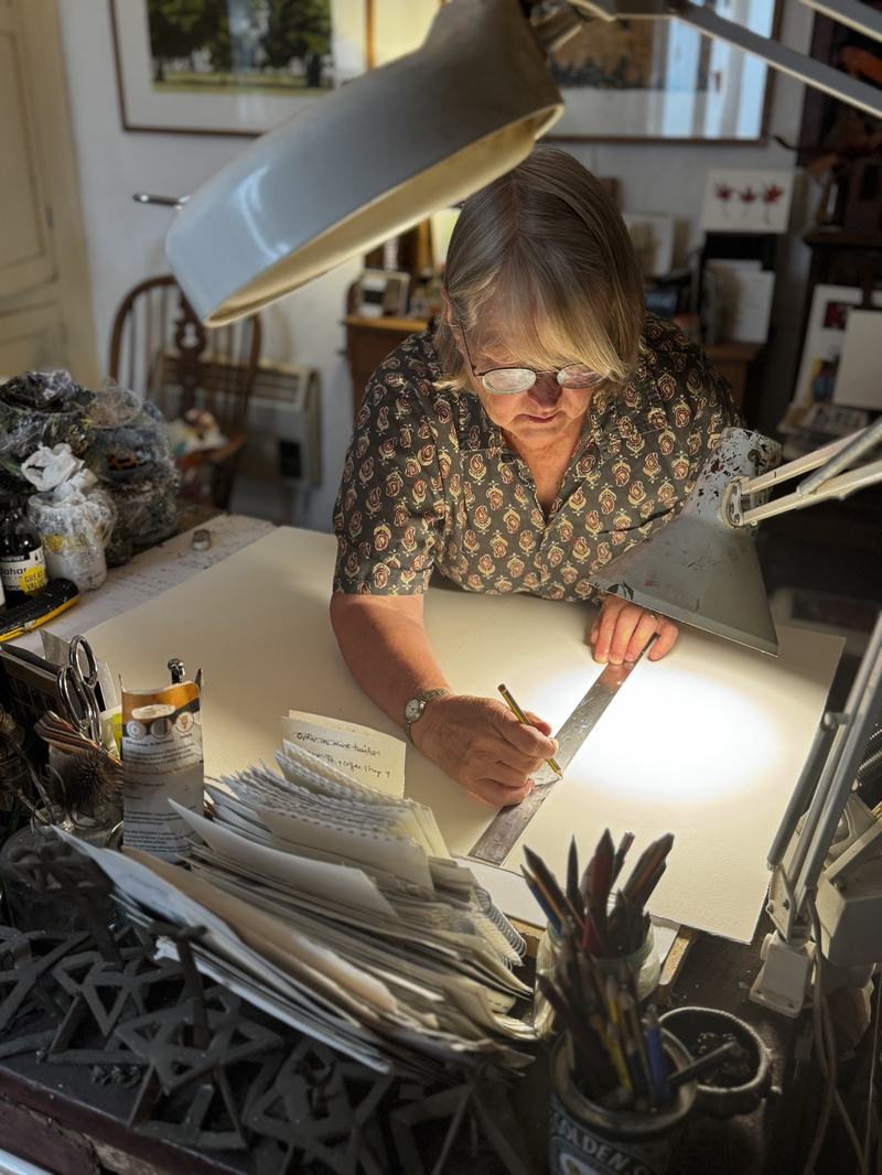 Ruth End at work, printmaking in her studio. Photography by Naomi Ness.