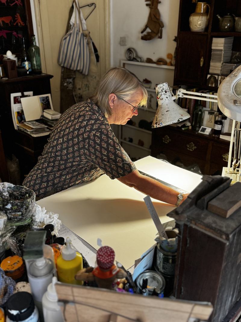 Ruth End at work, printmaking in her studio. Photography by Naomi Ness.